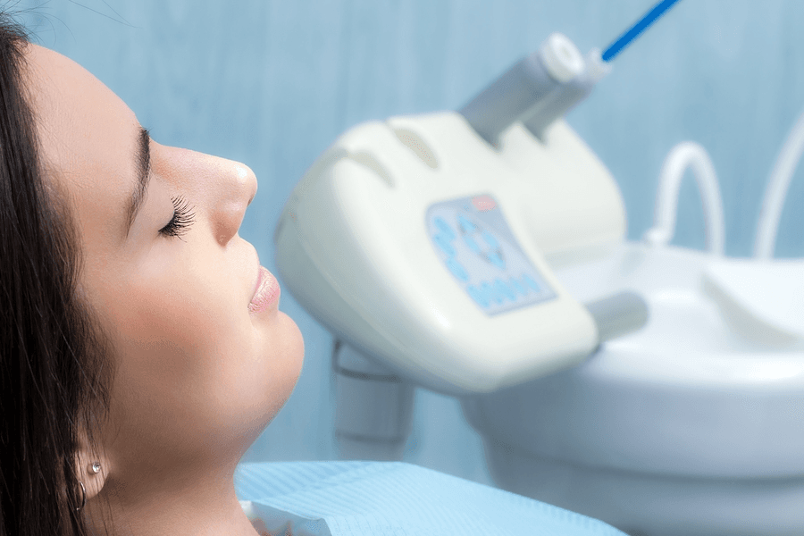 Relaxed patient receiving nitrous oxide sedation at Esthetique Dentistry Ashburn